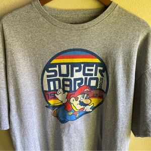 Super Mario Graphic Tshirt. Grey with Old School Mario Flying thru Air. XXL